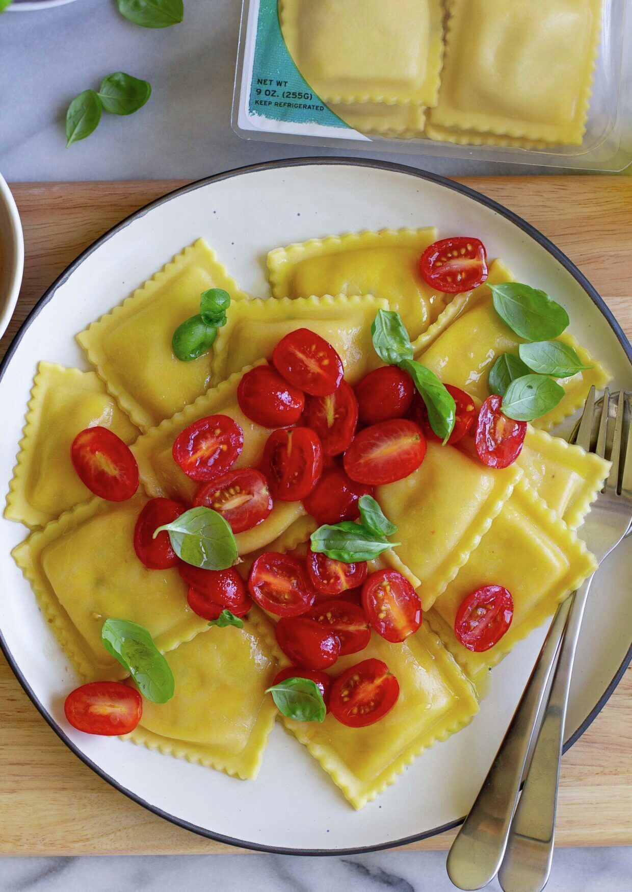 Fresh Mozzarella and Tomato Caprese Ravioli with Cherry Tomatoes, Olive Oil & Basil