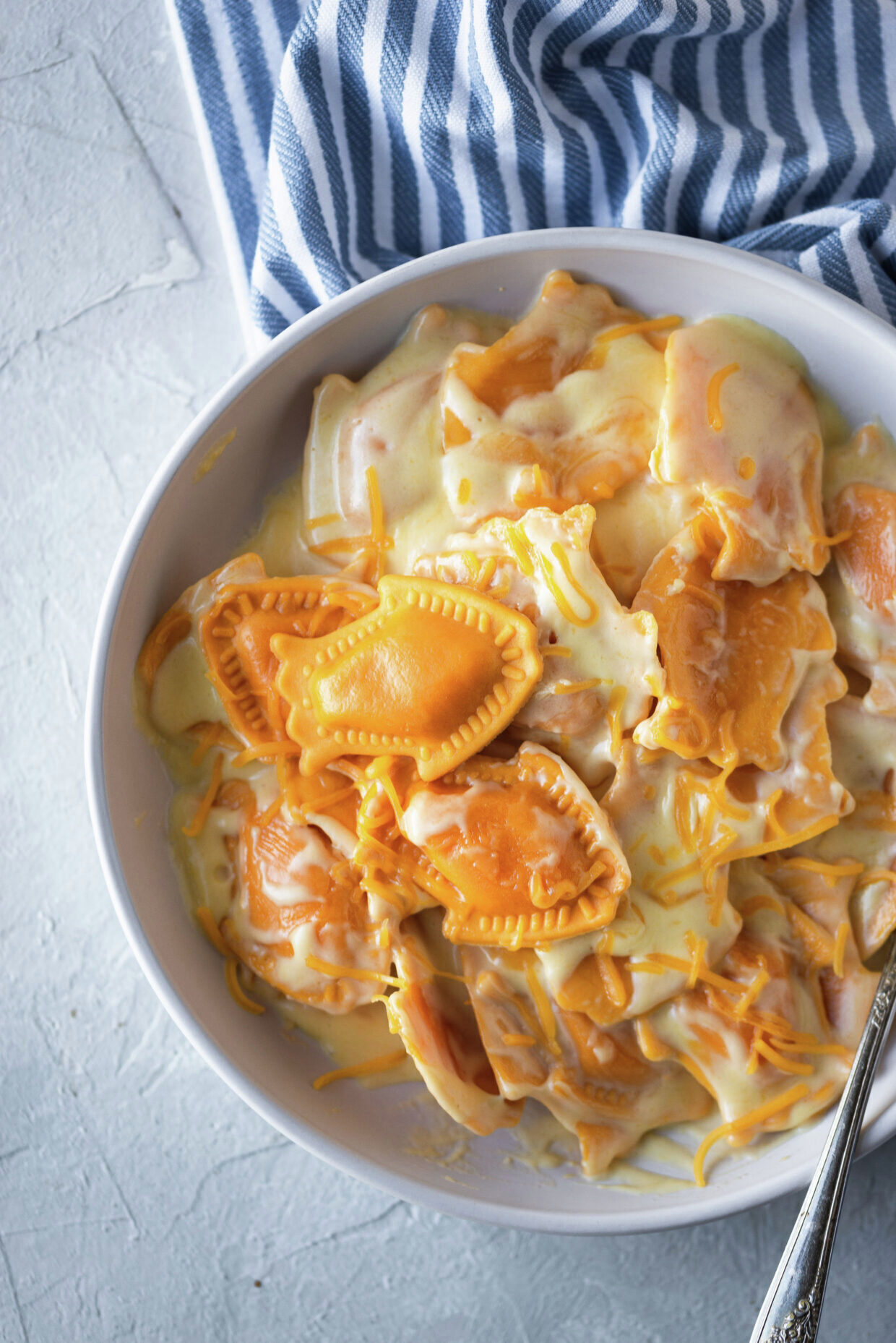 Mac-N-Cheezy Ravioli with Creamy Cheddar Sauce