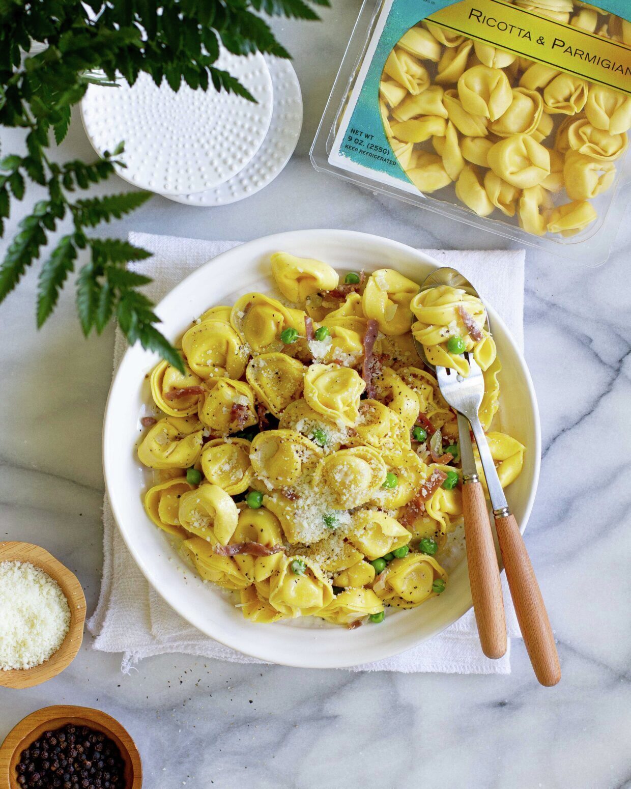 Ricotta and Parmigiano Tortellini with Prosciutto and Peas